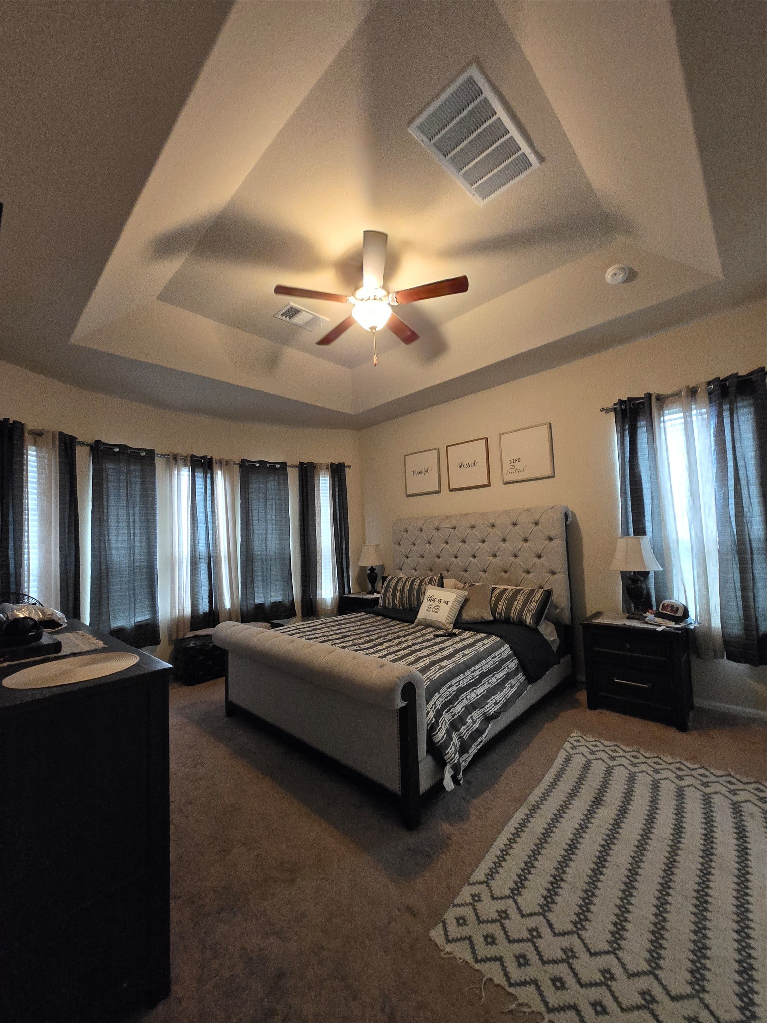 17451 Farm Pasture Trail Hockley, TX 77447 - Photo 10 of 27 a bedroom with double bed and a chandelier