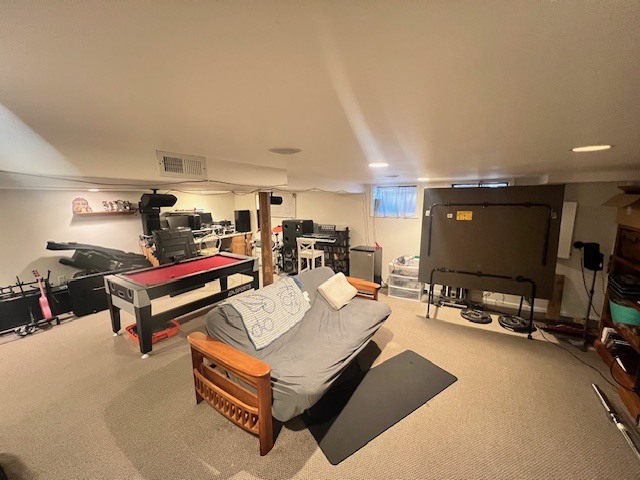 48 South Country Squire Road Palos Heights, IL 60463 - Photo 13 of 23 a living room with furniture a flat screen tv and a table