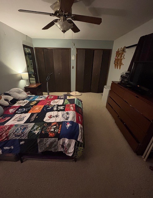 48 South Country Squire Road Palos Heights, IL 60463 - Photo 14 of 23 a bedroom with a bed and a chandelier