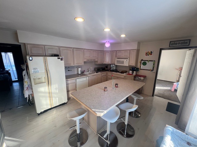 48 South Country Squire Road Palos Heights, IL 60463 - Photo 5 of 23 a kitchen with refrigerator and chairs