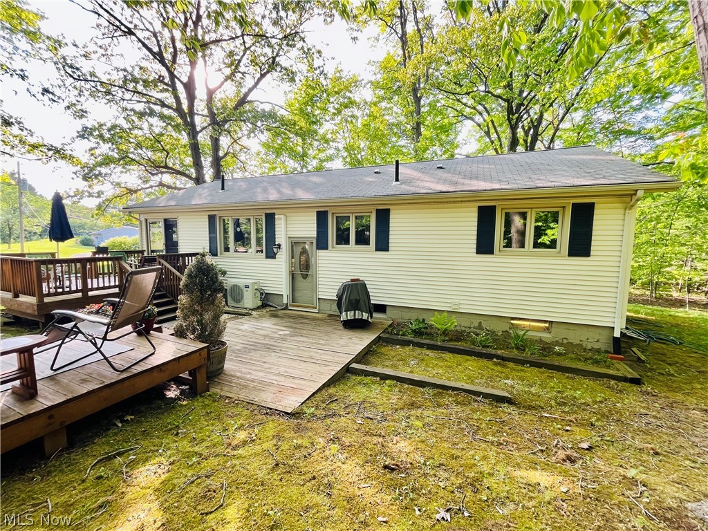 7220 Doty Road Madison, OH 44057 - Photo 15 of 50 Back of property featuring a wooden deck