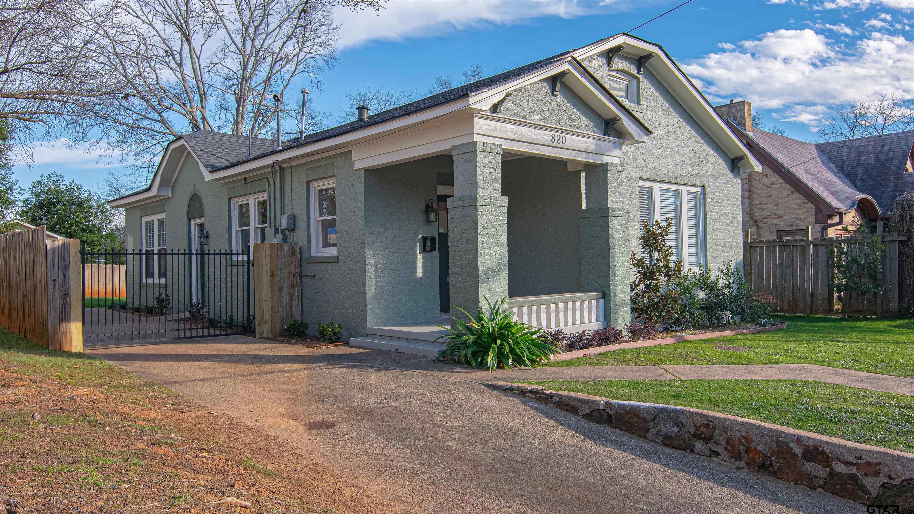 820 South Chilton Avenue Tyler, TX 75701 - Photo 20 of 20 a front view of a house with a yard