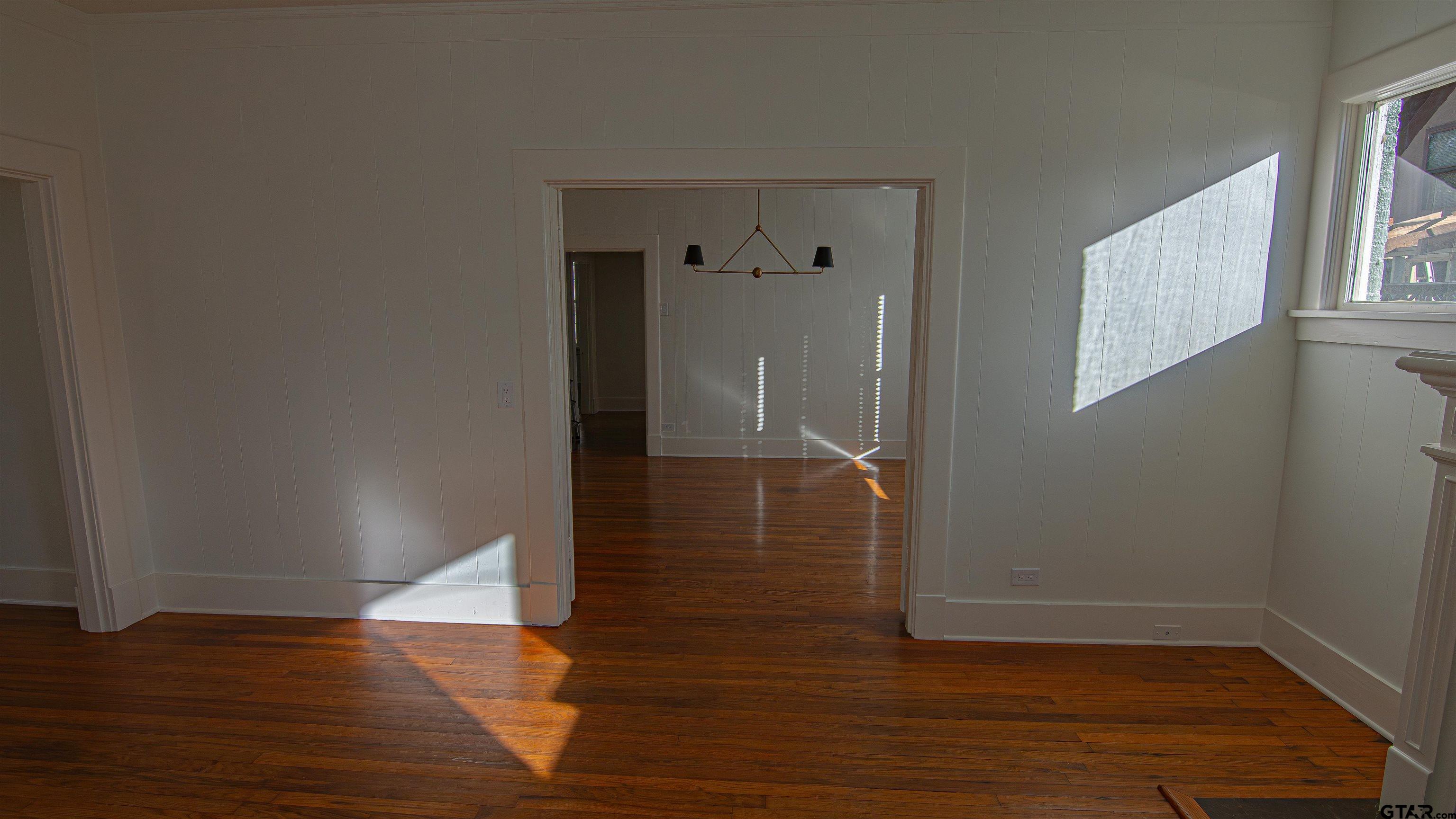 820 South Chilton Avenue Tyler, TX 75701 - Photo 7 of 20 a view of empty room with wooden floor