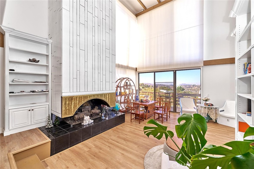 22702 Timbertop Lane Diamond Bar, CA 91765 - Photo 11 of 75 a living room with furniture and a large window