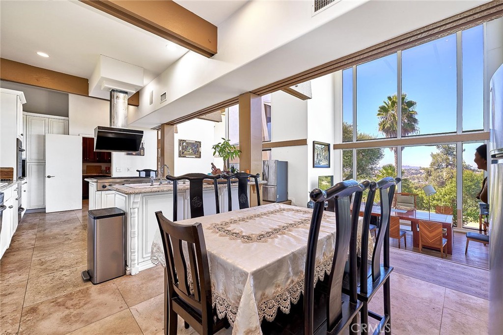 22702 Timbertop Lane Diamond Bar, CA 91765 - Photo 20 of 75 a view of a dining room with furniture window and outside view