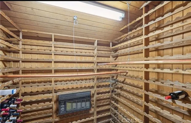 a bathroom with a granite countertop tub shower and sink