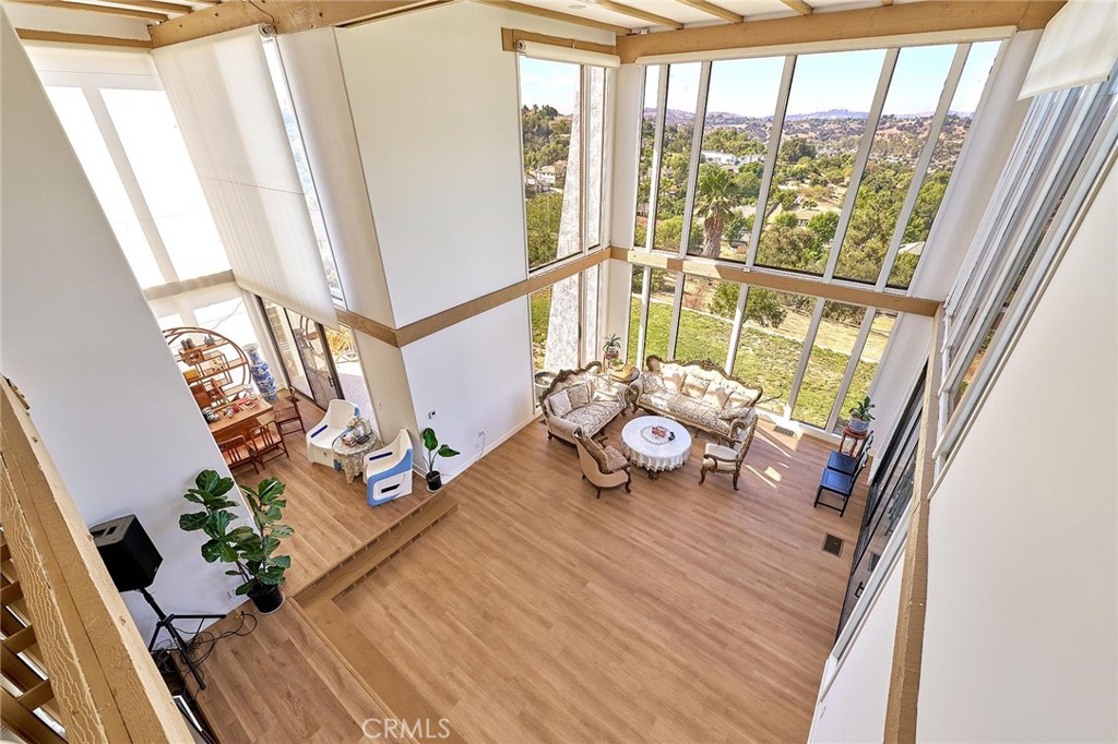 22702 Timbertop Lane Diamond Bar, CA 91765 - Photo 33 of 75 a view of a living room with furniture and floor to ceiling window