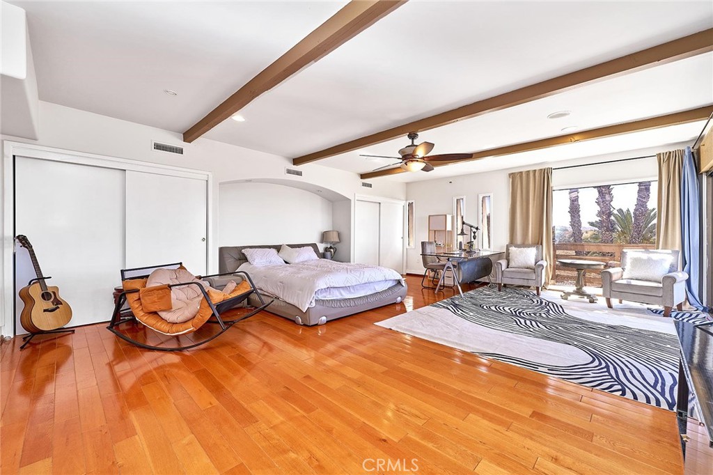 22702 Timbertop Lane Diamond Bar, CA 91765 - Photo 40 of 75 a bedroom with a bed and wooden floor