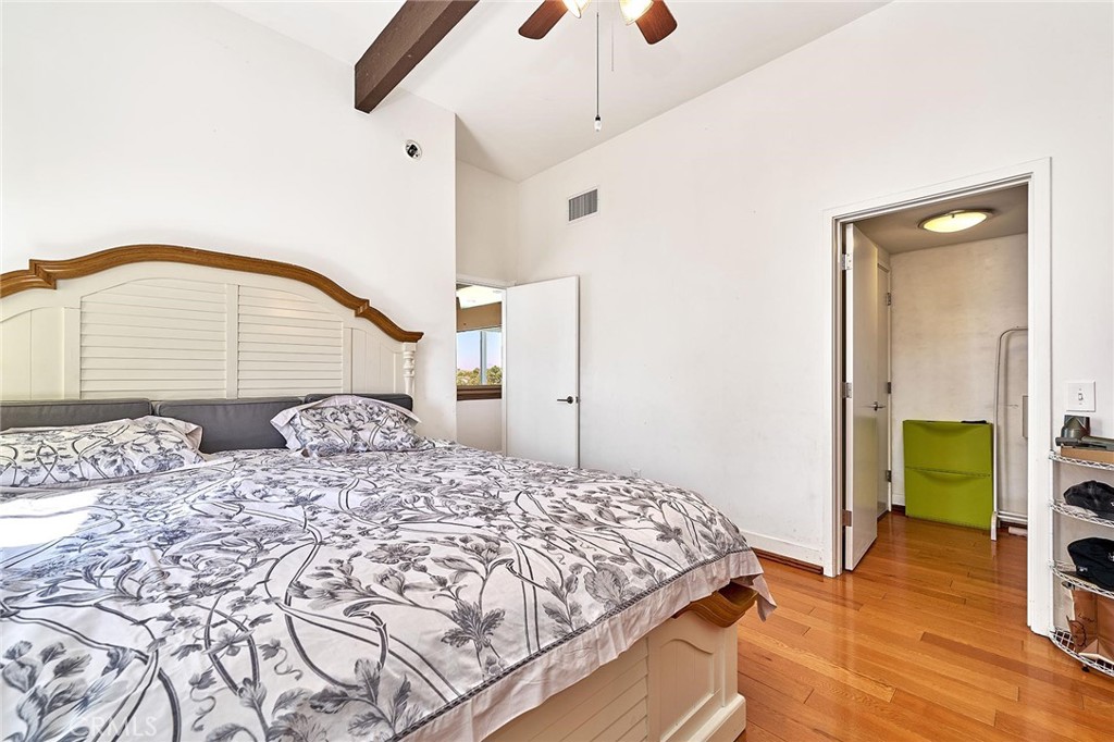 22702 Timbertop Lane Diamond Bar, CA 91765 - Photo 52 of 75 a bedroom with a large bed and a chandelier