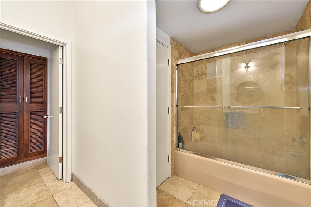 22702 Timbertop Lane Diamond Bar, CA 91765 - Photo 53 of 75 a bathroom with a bathtub and a shower