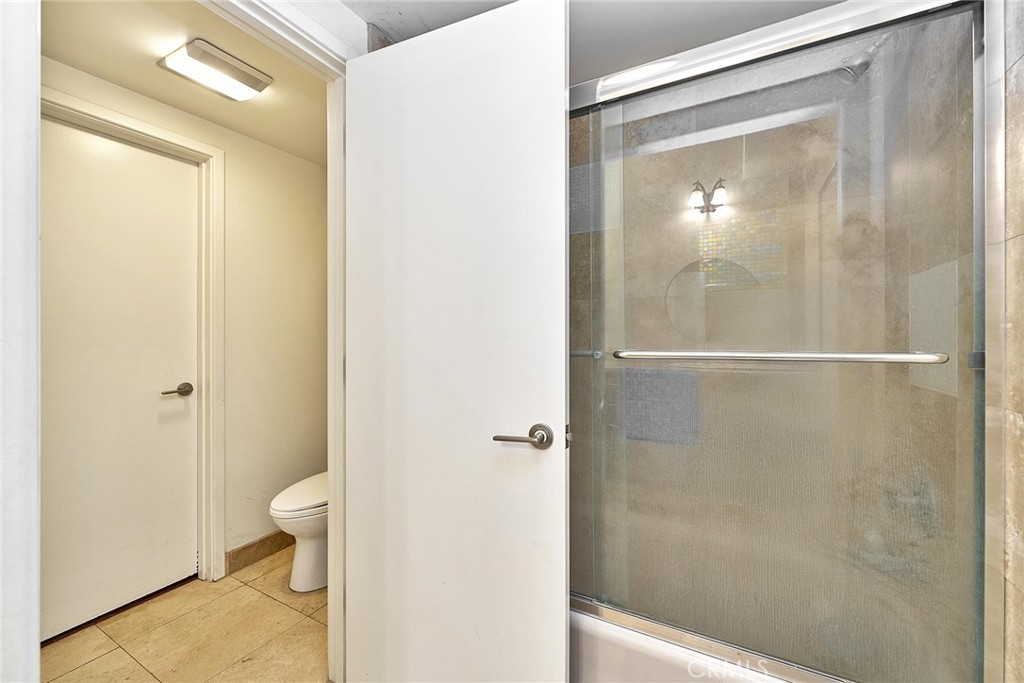 22702 Timbertop Lane Diamond Bar, CA 91765 - Photo 54 of 75 a bathroom with a shower and a toilet