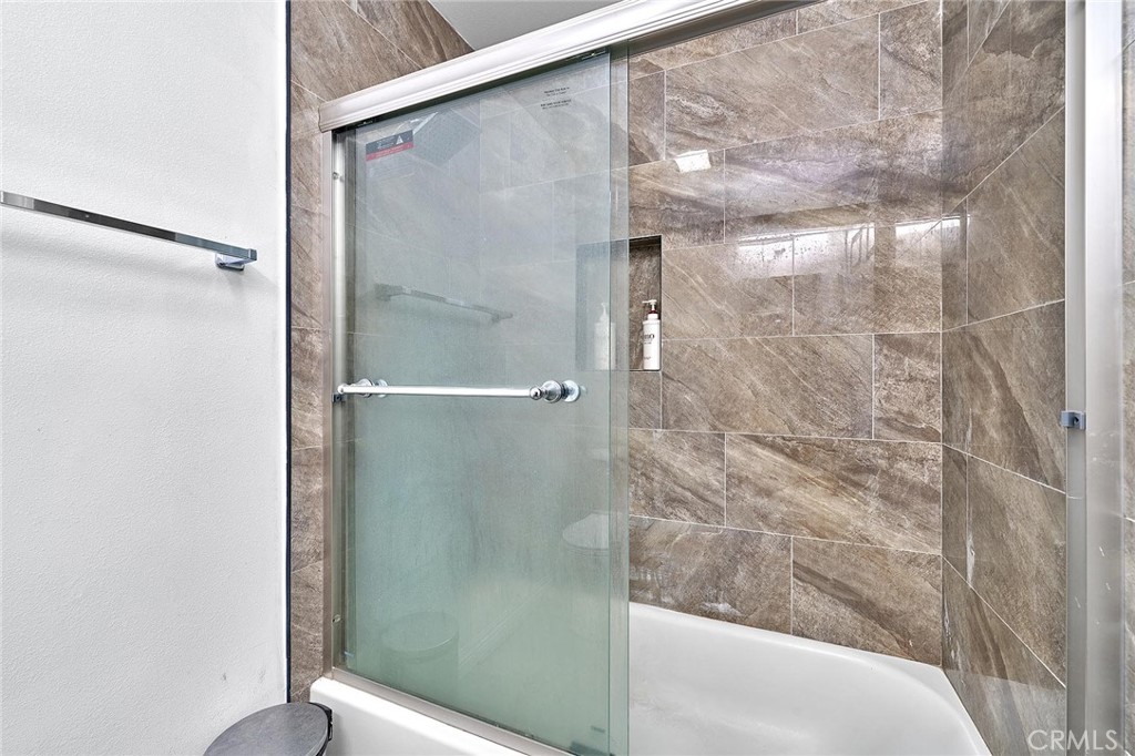 22702 Timbertop Lane Diamond Bar, CA 91765 - Photo 64 of 75 a bathroom with a glass shower door