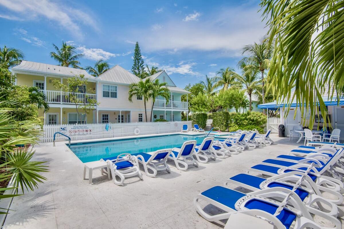 620 Thomas Street, Unit 175 Key West, FL 33040 - Photo 30 of 30 a front view of a house with outdoor seating