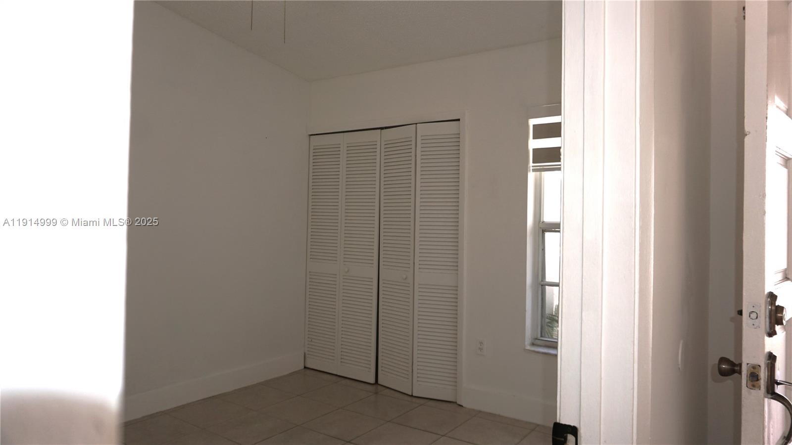 13479 Southwest 62nd Street Miami, FL 33183 - Photo 17 of 27 a view of an empty room