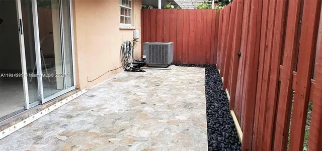 a view of a backyard of a house