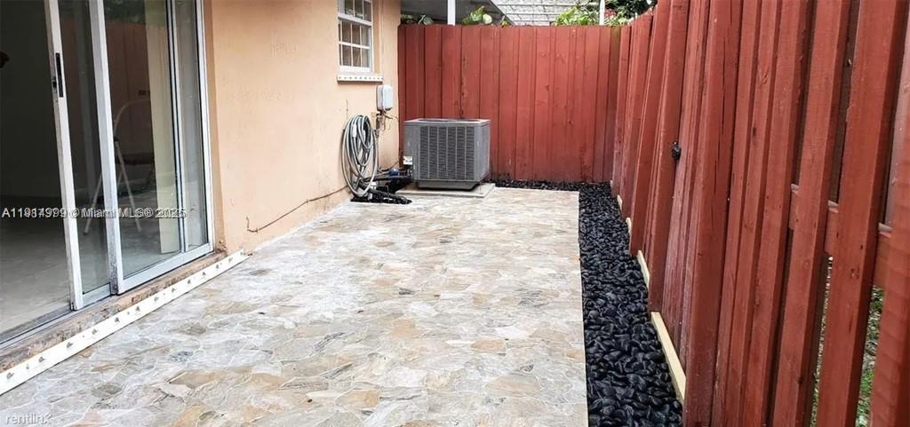 13479 Southwest 62nd Street Miami, FL 33183 - Photo 21 of 27 a view of a backyard of a house