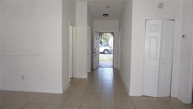 a car parked in front of a house