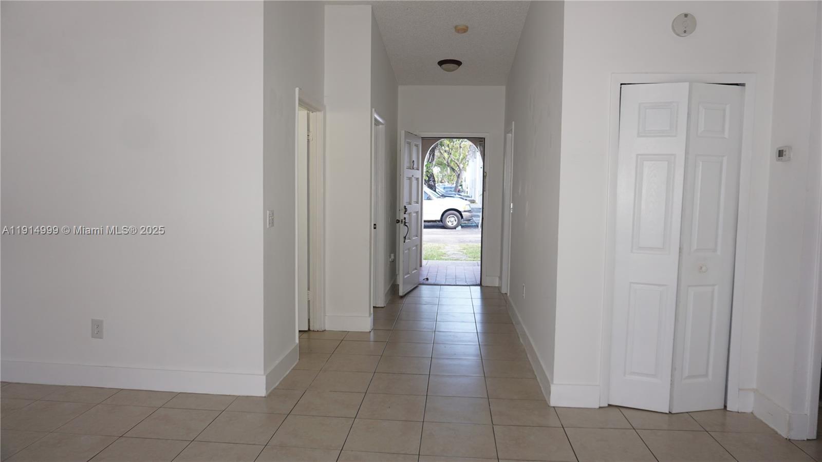 13479 Southwest 62nd Street Miami, FL 33183 - Photo 23 of 27 a view of a hallway with wooden floor