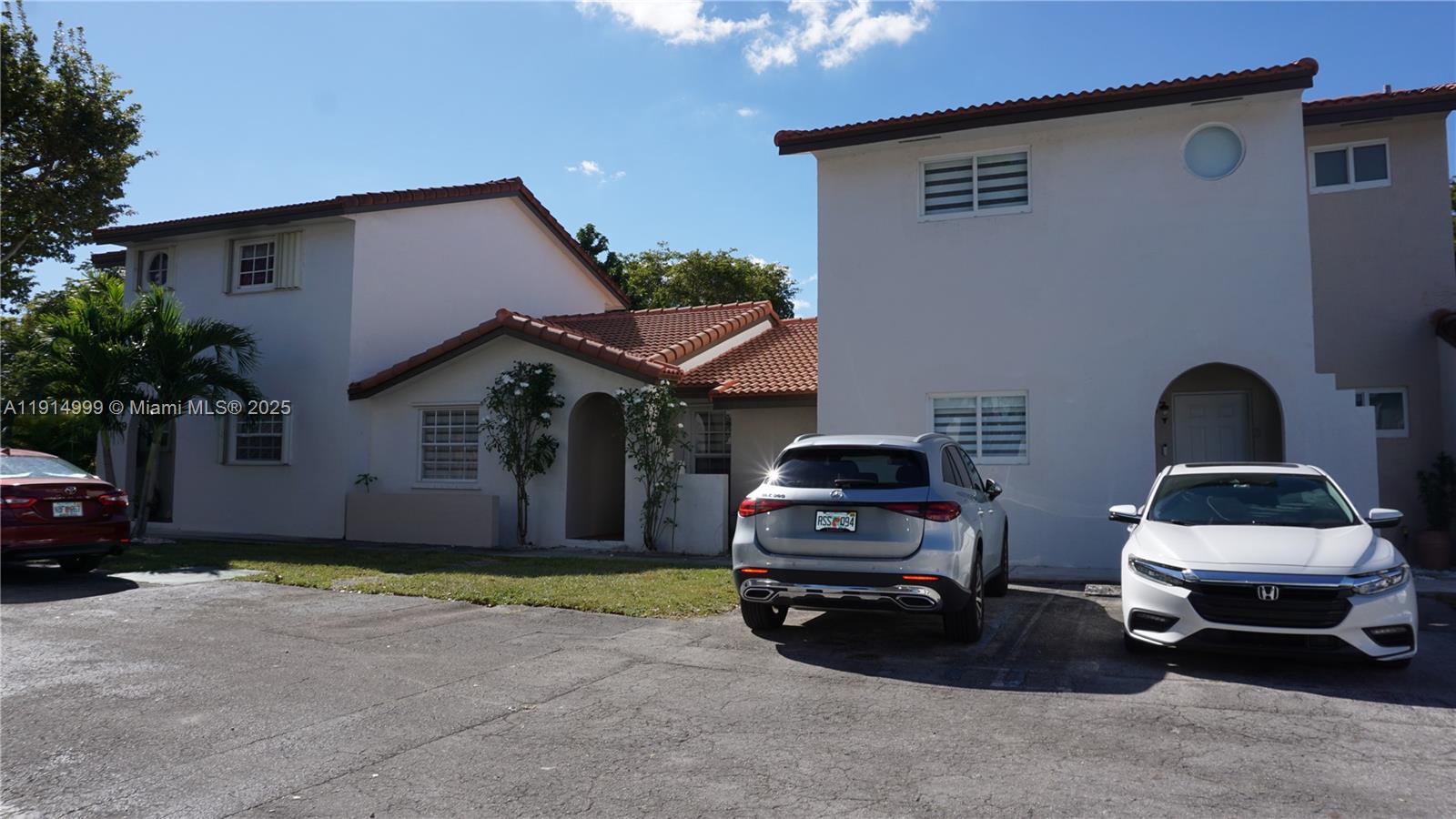 13479 Southwest 62nd Street Miami, FL 33183 - Photo 24 of 27 a car parked in front of a house