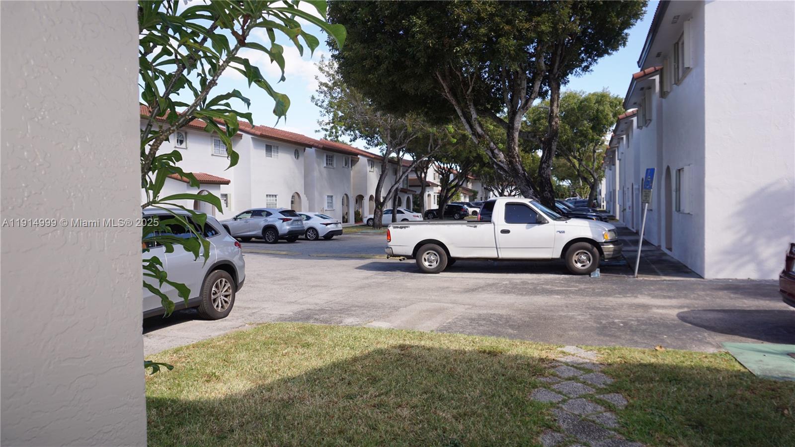 13479 Southwest 62nd Street Miami, FL 33183 - Photo 25 of 27 a view of car parked in front of a house