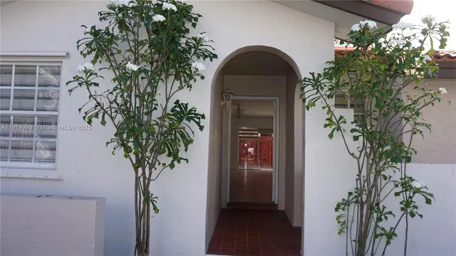 a view of a house with a plants