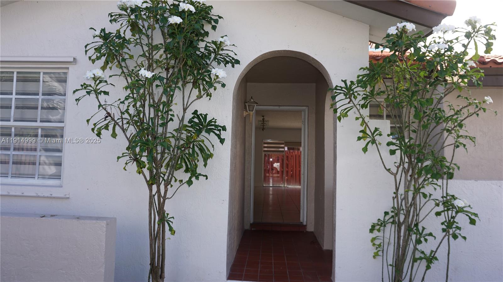 13479 Southwest 62nd Street Miami, FL 33183 - Photo 3 of 27 a view of a house with a plants