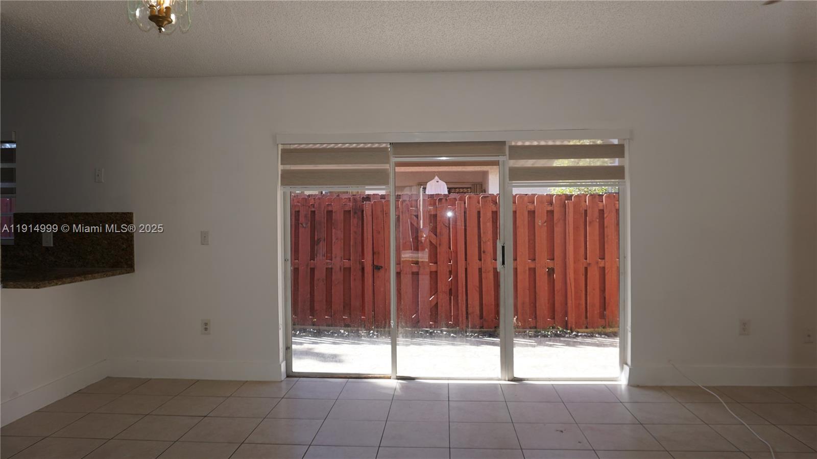 13479 Southwest 62nd Street Miami, FL 33183 - Photo 6 of 27 a room with a water heater on the wall