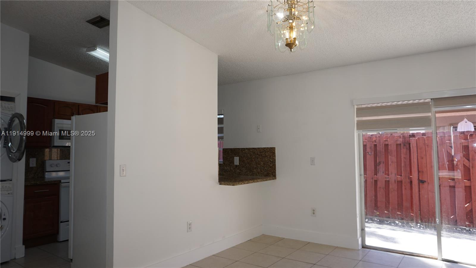 13479 Southwest 62nd Street Miami, FL 33183 - Photo 7 of 27 a room with closet and a window