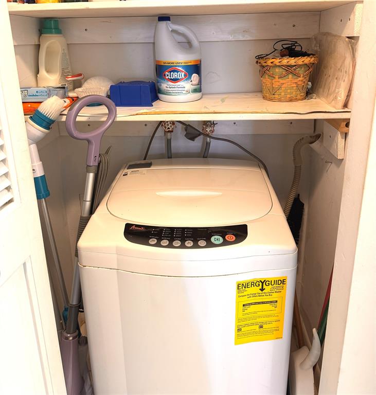 7950 West McNab Road, Unit 203 Tamarac, FL 33321 - Photo 16 of 21 a utility room with dryer and washer