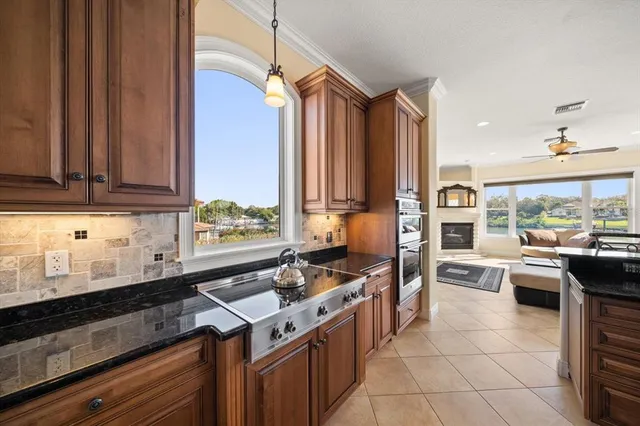 a view of a livingroom with furniture and a chandelier
