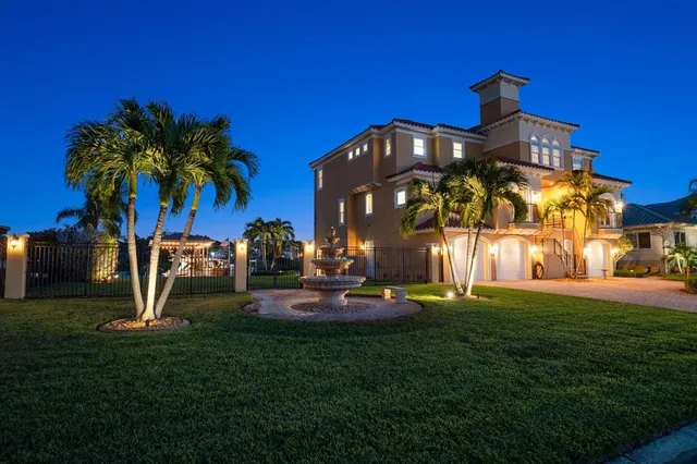 a view of a swimming pool and an outdoor seating