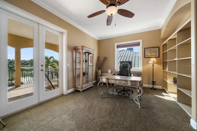 a view of a lake with a house in the background