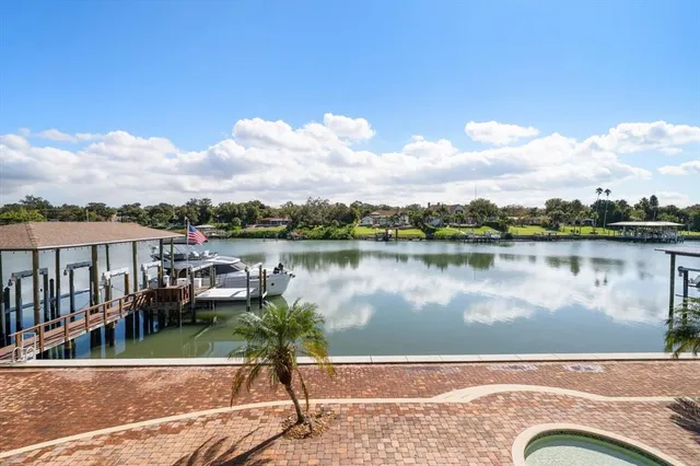 a view of a house with swimming pool and a yard