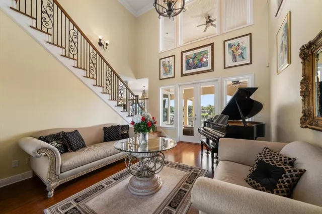 a kitchen with stainless steel appliances a stove a sink dishwasher and cabinets with wooden floor