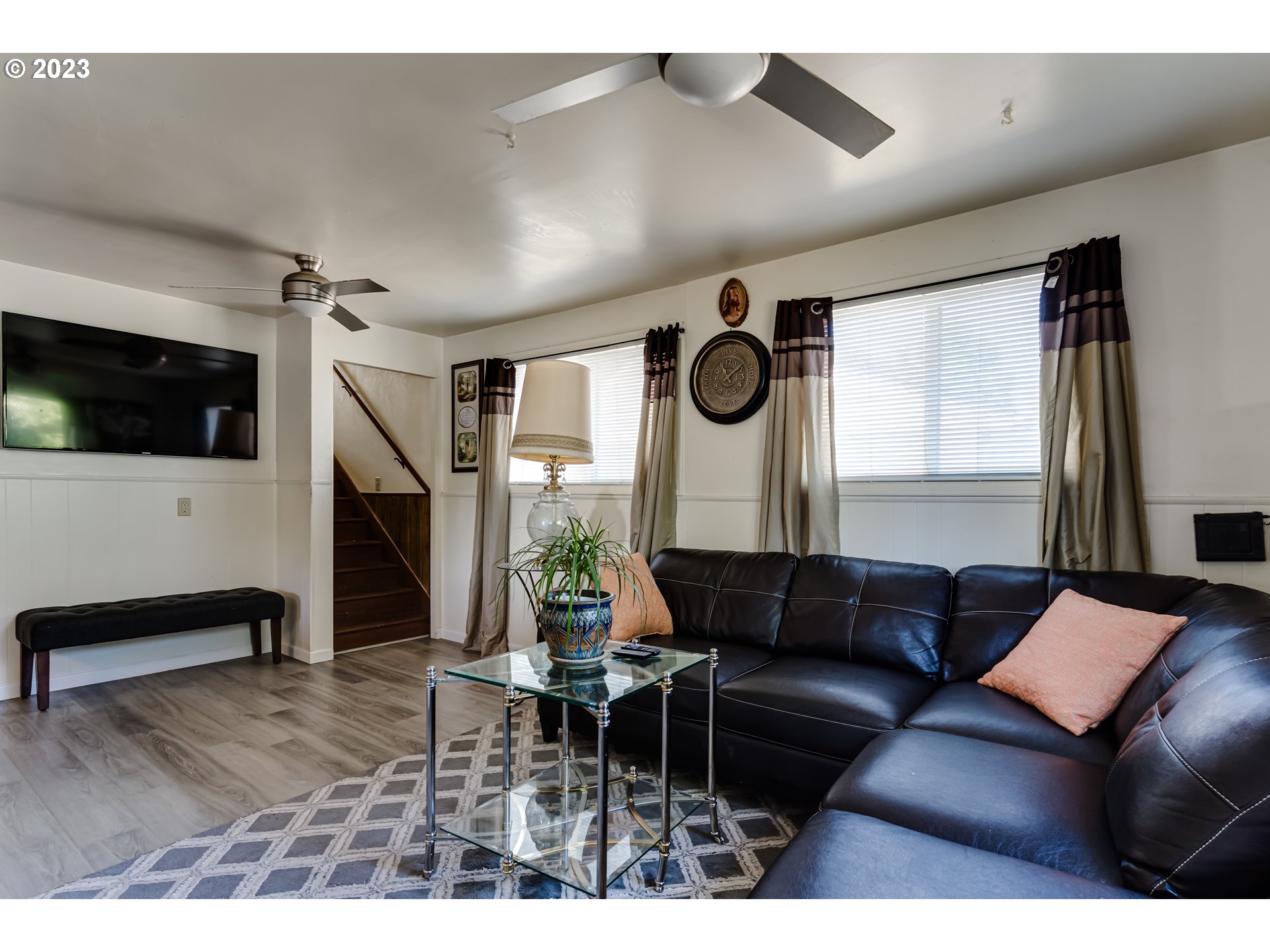 1400 I Street Springfield, OR 97477 - Photo 6 of 16 a living room with furniture a flat screen tv and a window