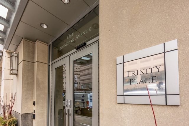 a view of a bathroom with a glass door shower and sink