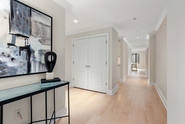 a view of a hallway with workspace