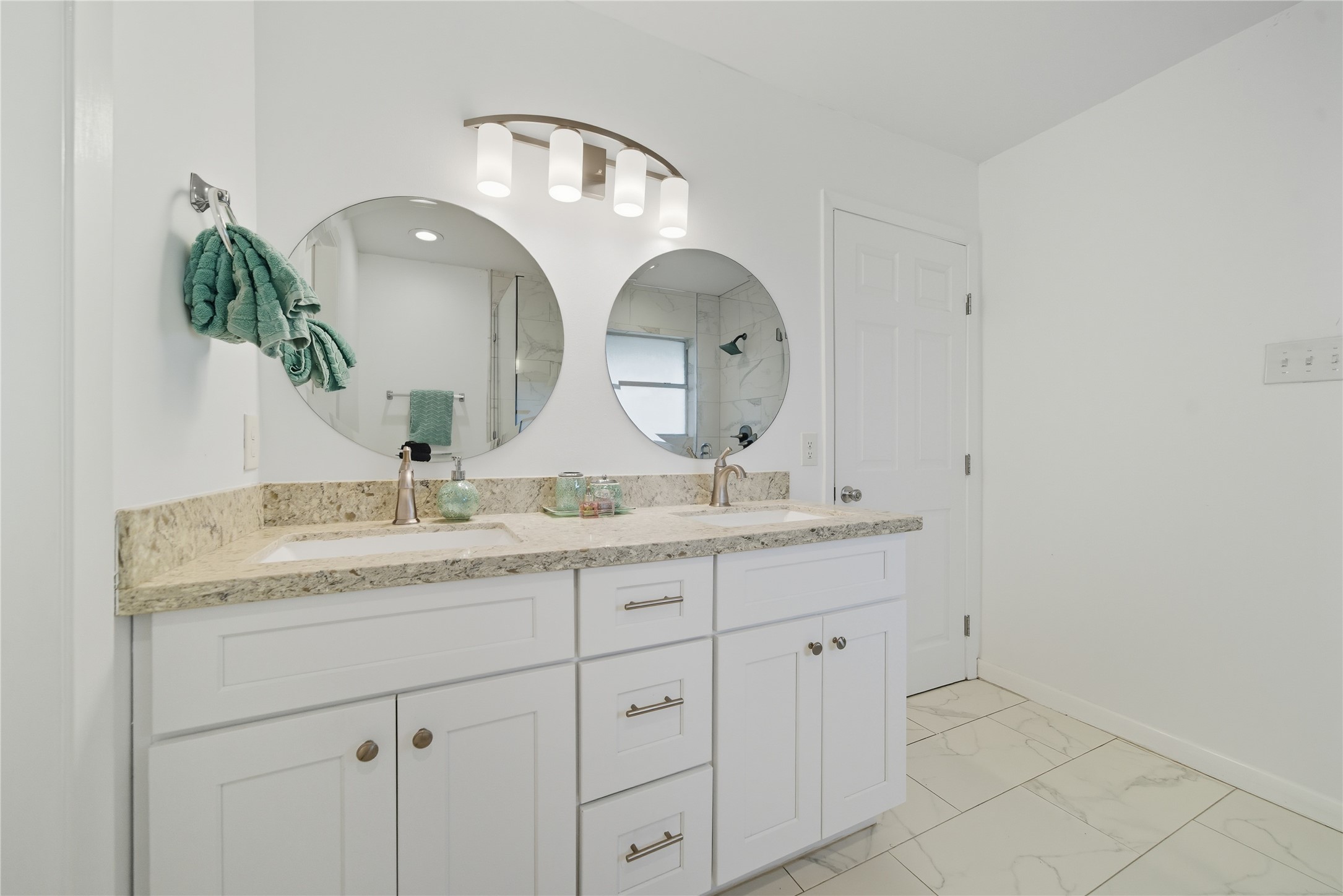 11223 Greenwillow Street Houston, TX 77035 - Photo 16 of 29 a bathroom with a granite countertop double vanity sink and a mirror