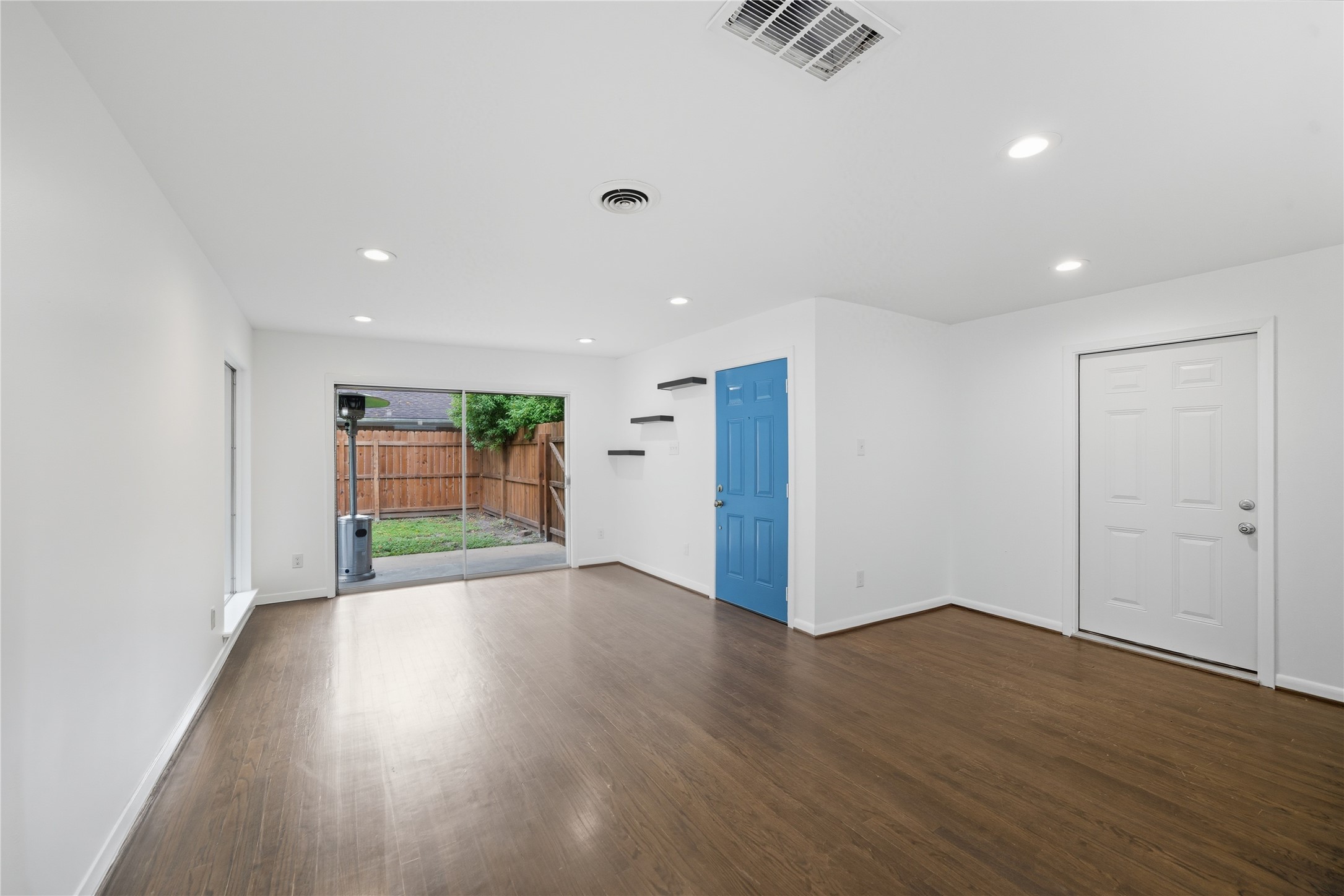 11223 Greenwillow Street Houston, TX 77035 - Photo 2 of 29 a view of a livingroom with wooden floor