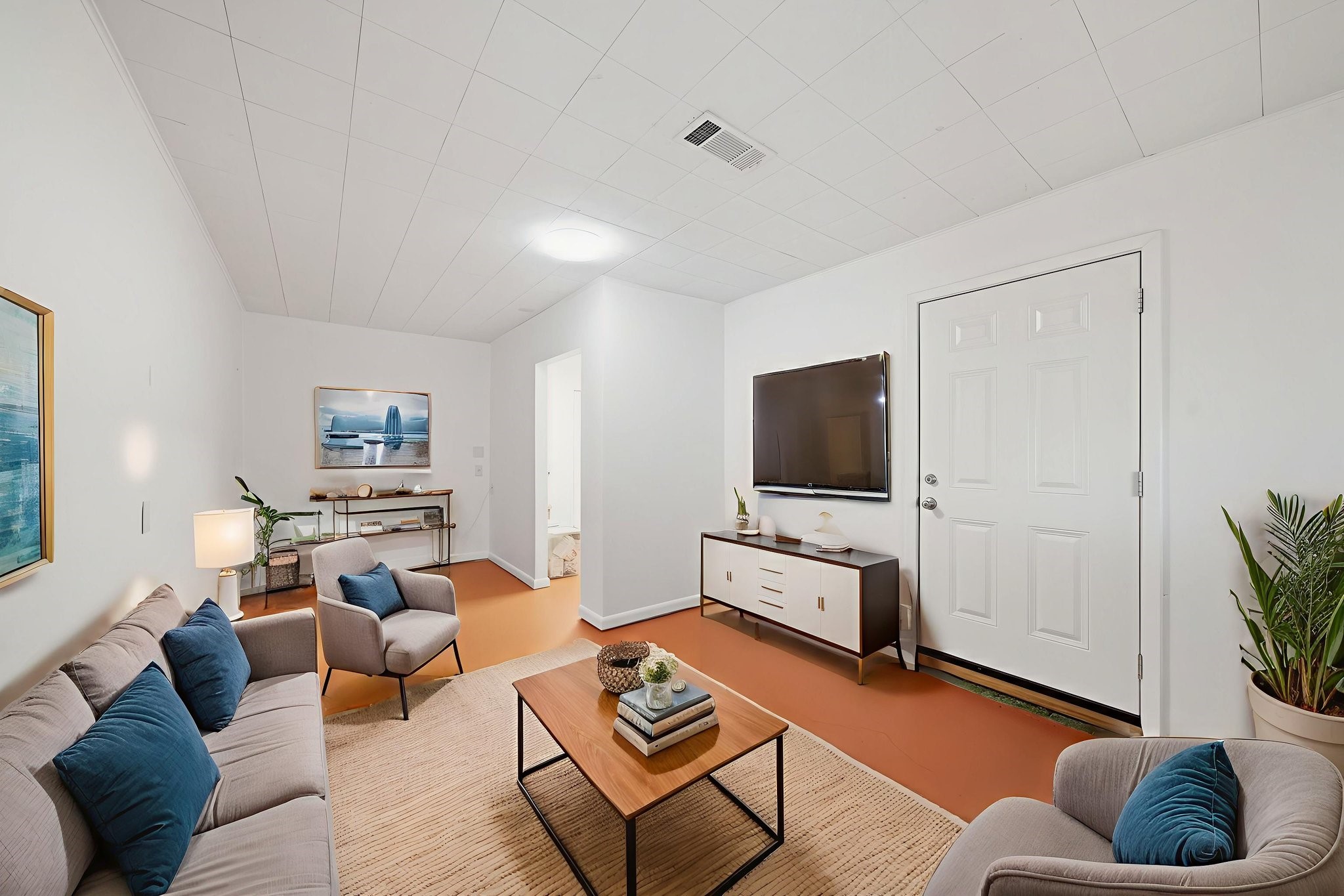 11223 Greenwillow Street Houston, TX 77035 - Photo 23 of 29 a living room with furniture and a flat screen tv
