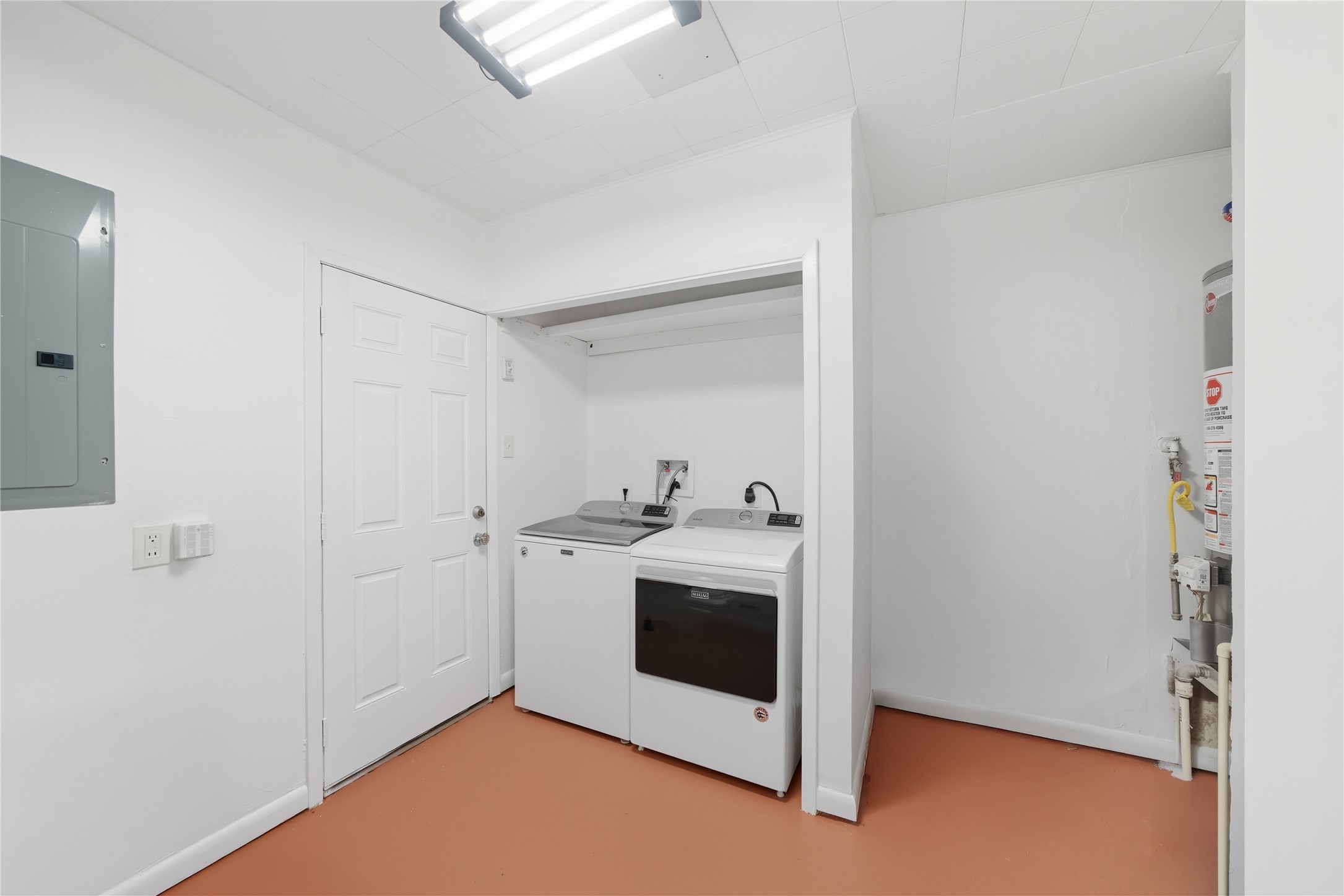 11223 Greenwillow Street Houston, TX 77035 - Photo 25 of 29 a utility room with washer and dryer