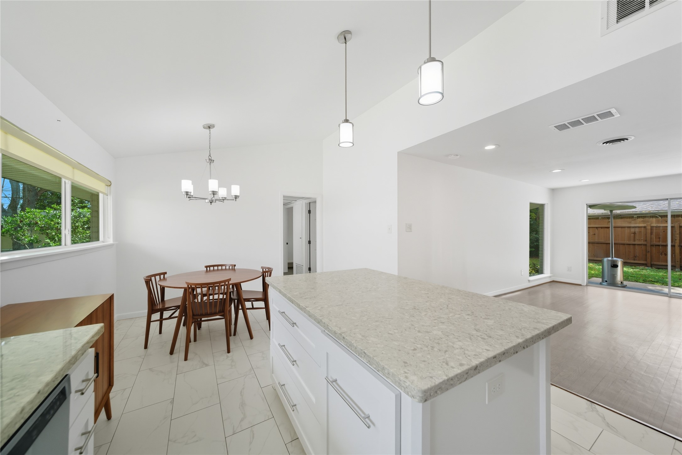 11223 Greenwillow Street Houston, TX 77035 - Photo 10 of 29 a view of a kitchen and dining table