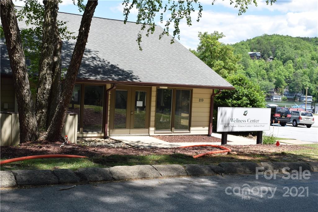 8 High Rd Court Lake Lure, NC 28746 - Photo 16 of 22 a view of a house with backyard sitting area and garden