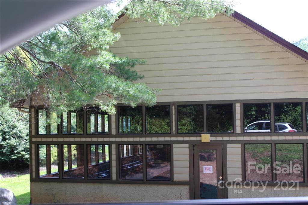 8 High Rd Court Lake Lure, NC 28746 - Photo 17 of 22 a front view of house with deck and outdoor seating