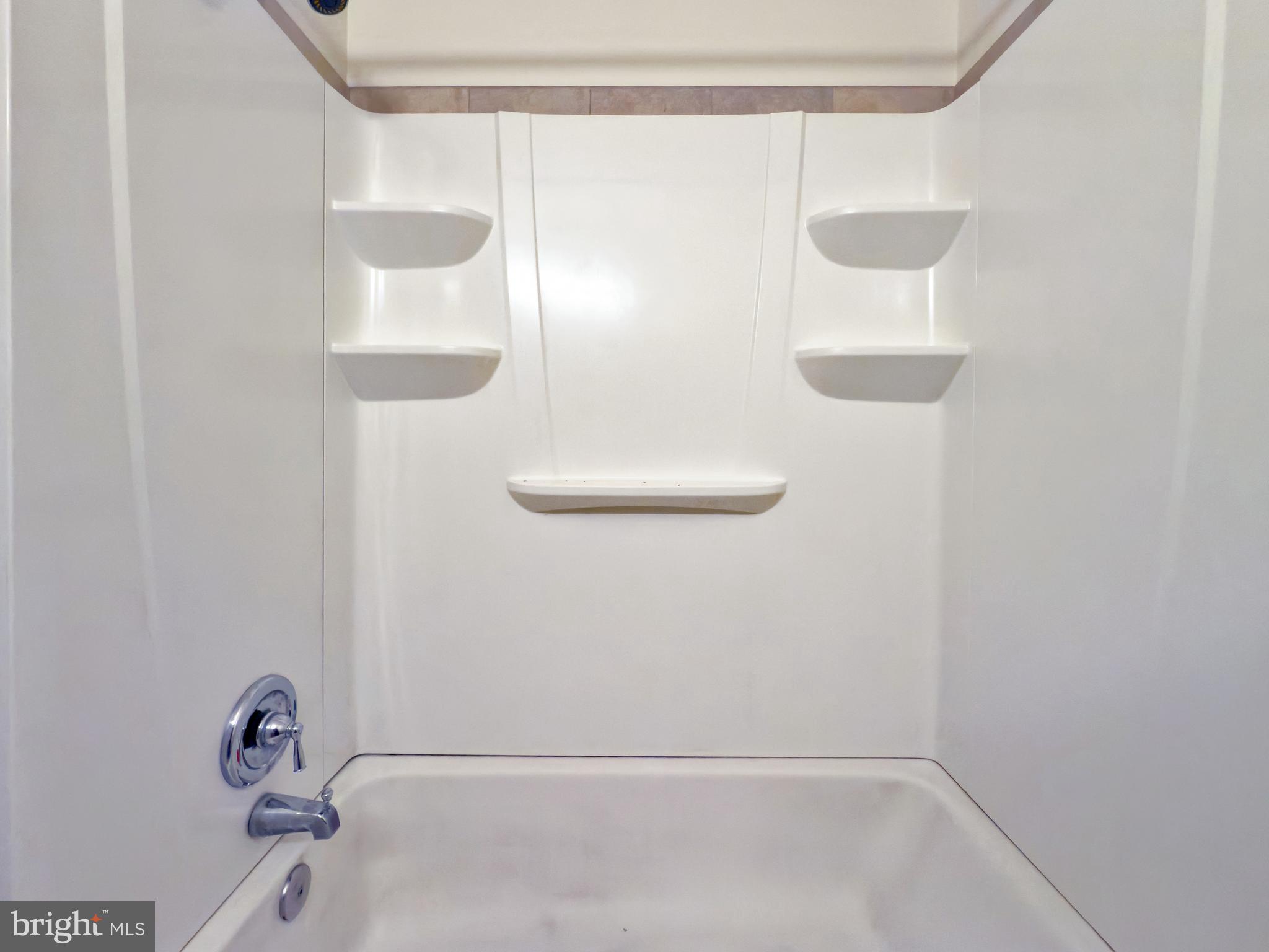 9754 East Roosevelt Boulevard, Unit 2 Philadelphia, PA 19115 - Photo 18 of 22 a bathroom with a shower