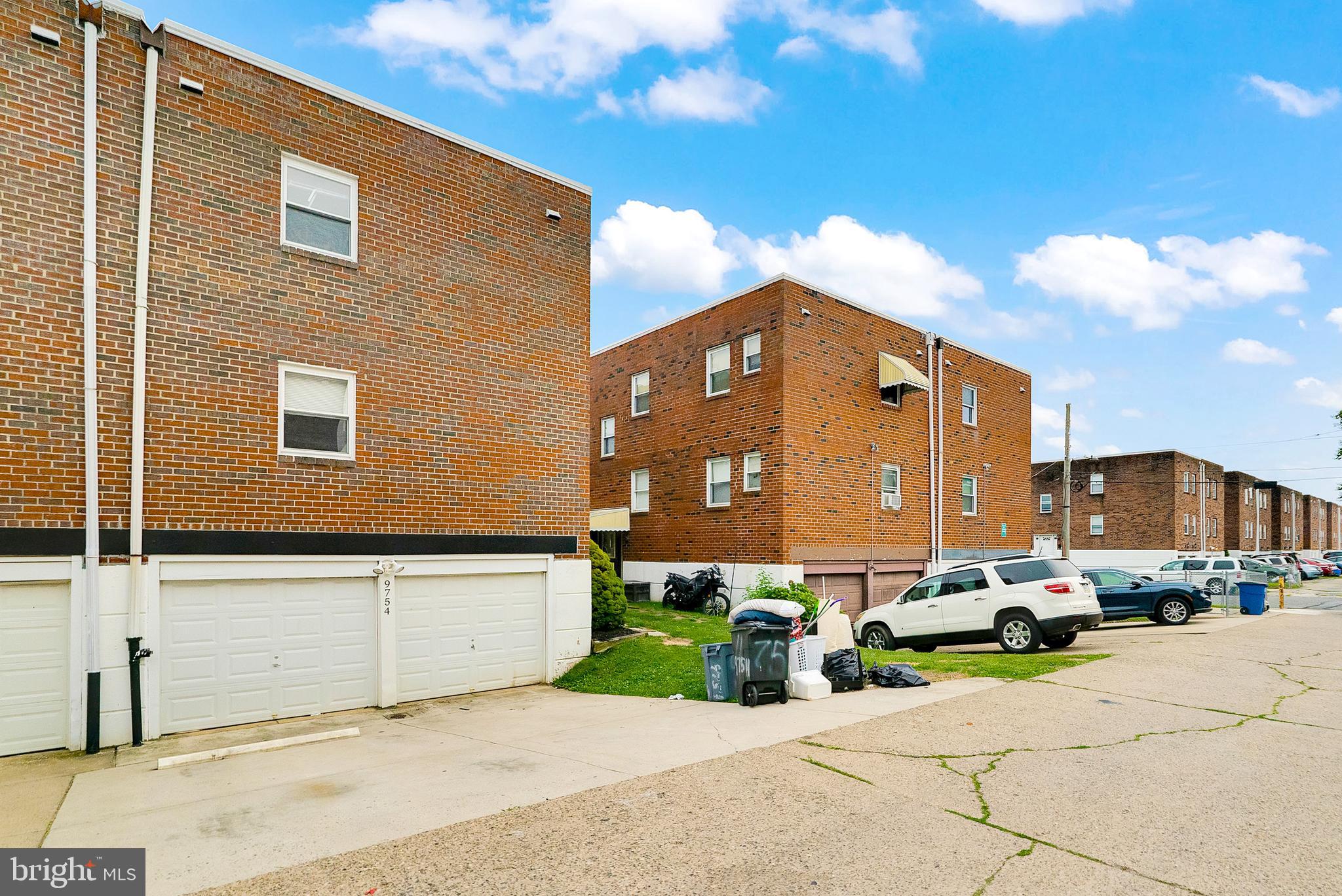 9754 East Roosevelt Boulevard, Unit 2 Philadelphia, PA 19115 - Photo 21 of 22 a front view of a building with cars parked