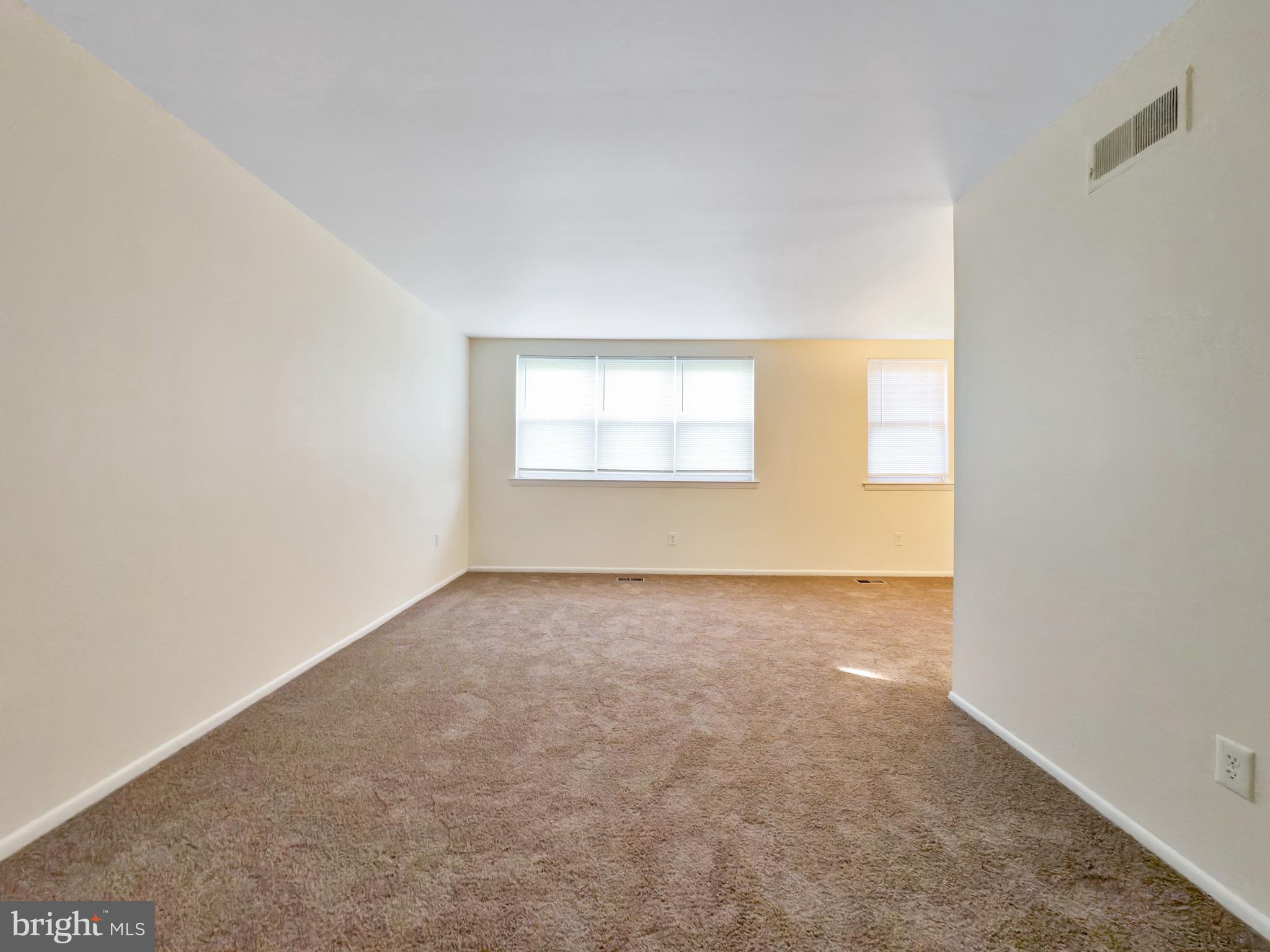 9754 East Roosevelt Boulevard, Unit 2 Philadelphia, PA 19115 - Photo 5 of 22 an empty room with a window