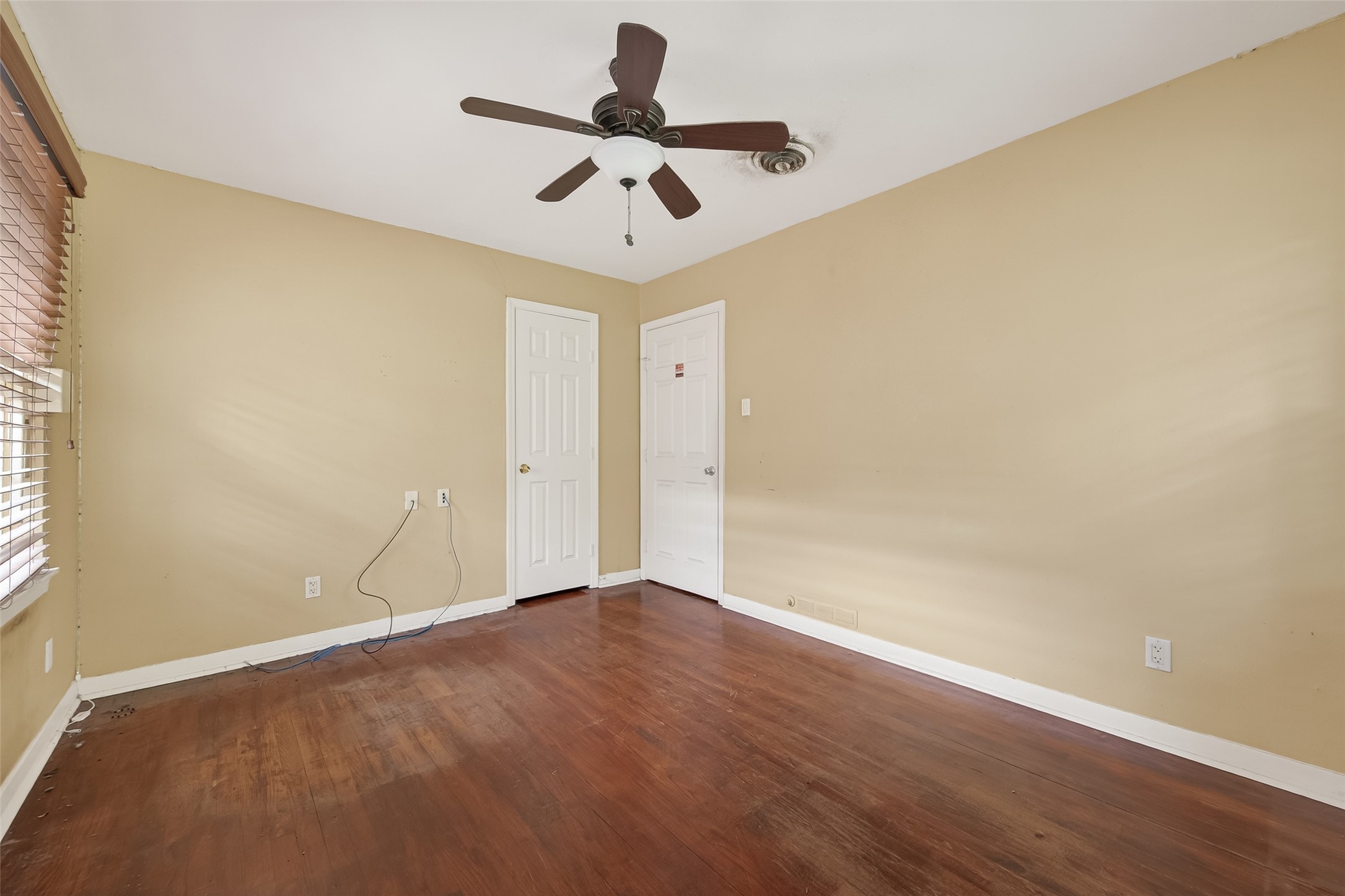 5114 West 43rd Street Houston, TX 77092 - Photo 22 of 31 wooden floor in an empty room