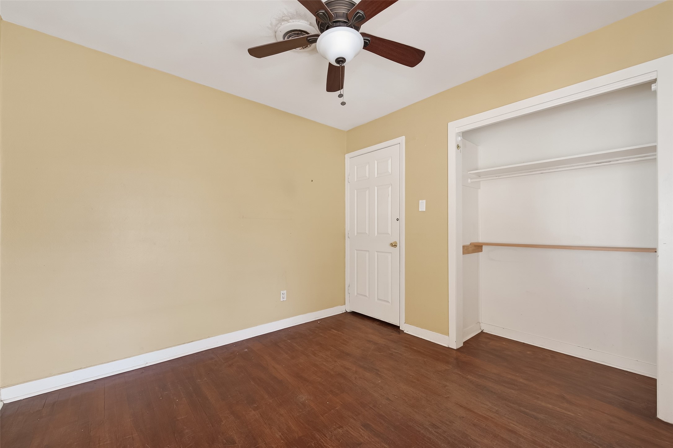 5114 West 43rd Street Houston, TX 77092 - Photo 27 of 31 a view of an empty room with wooden floor