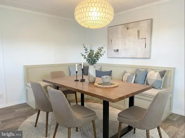 a view of a dining room with furniture